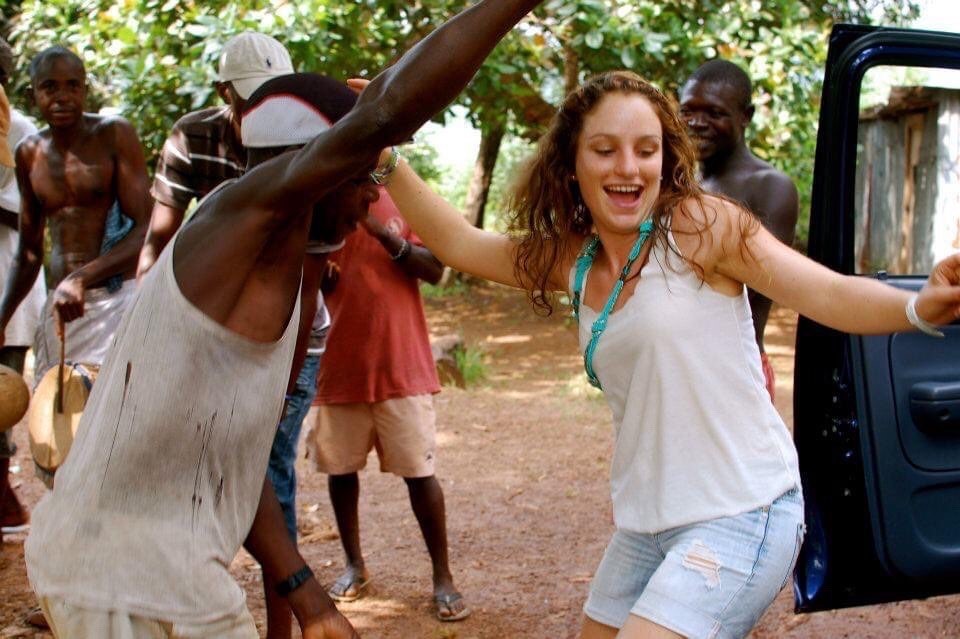 Kat Cavacas, Make Ways Foundation founder dancing in Sierra Leone